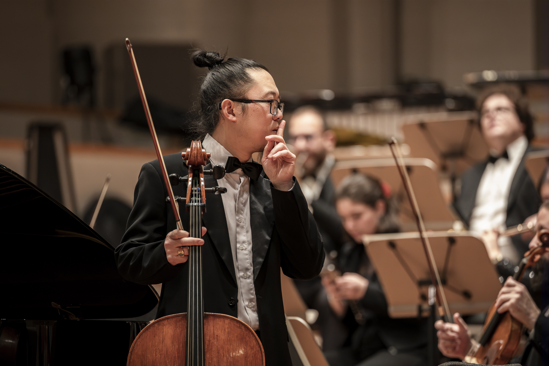 Cellist of the Empyrean Orchestra before their entrance